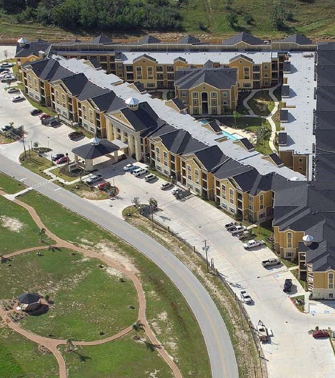 Aerial view of affordable housing buildings in a triangular shape