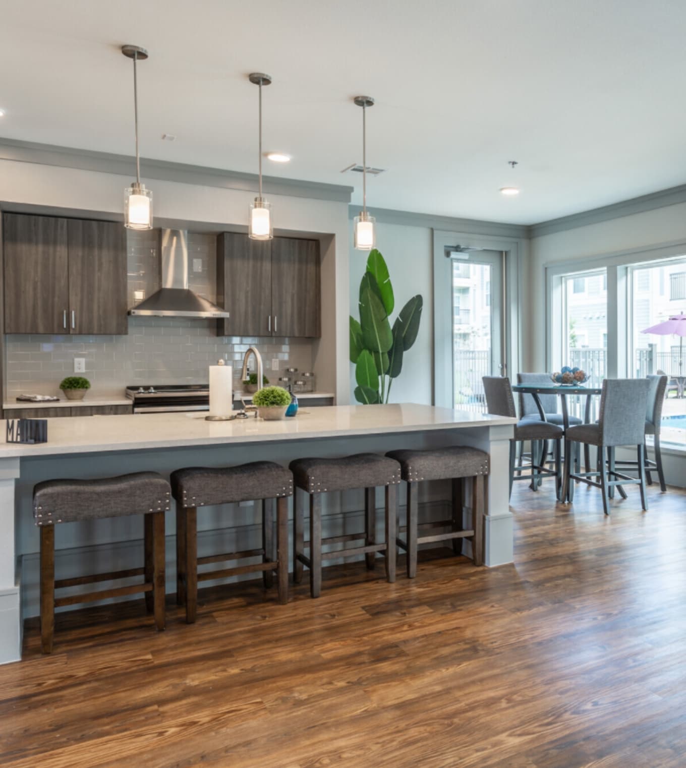 Open concept kitchen with island and adjacent dining area